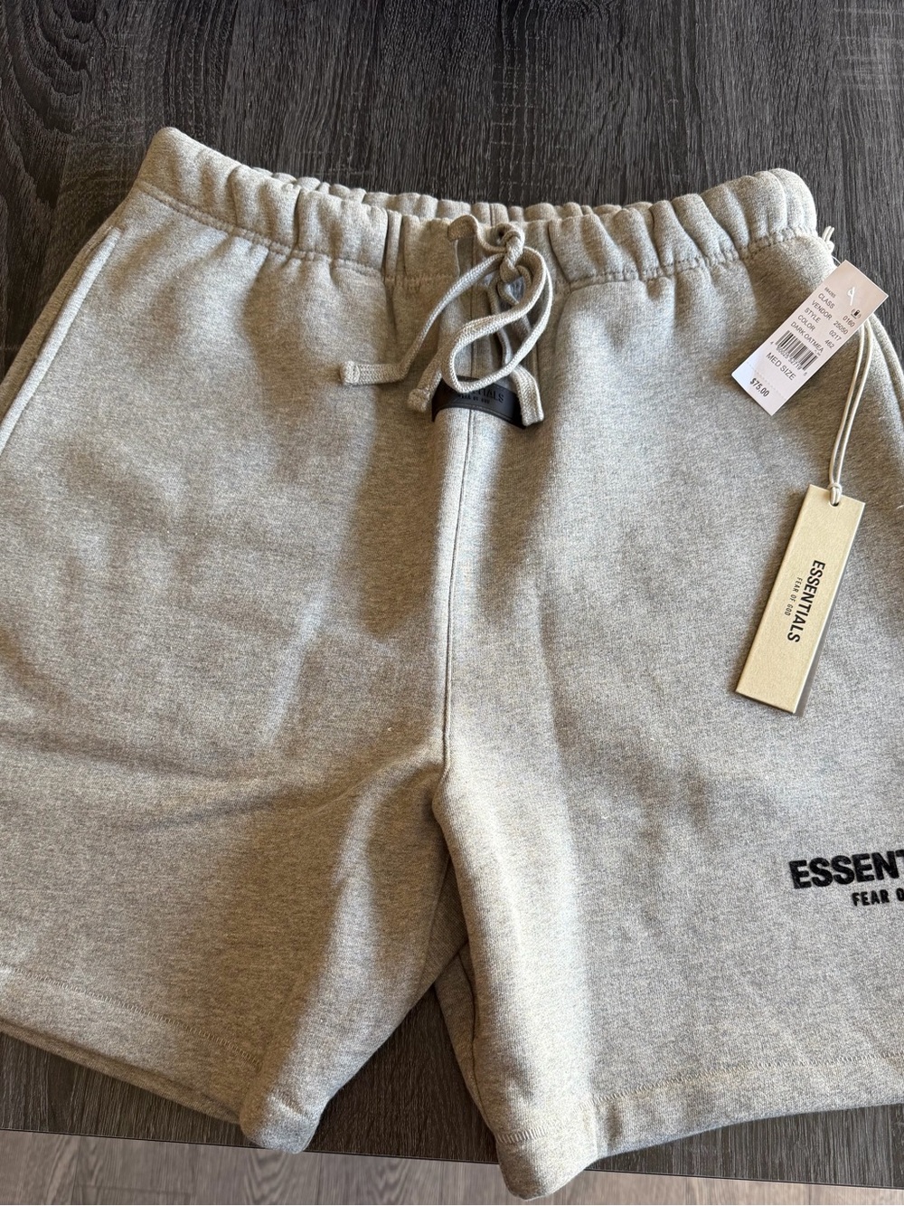 ESSENTIALS fear of god dark oatmeal sweat shorts